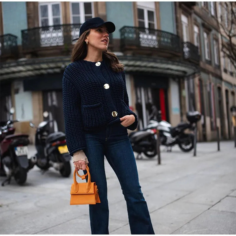 classic yet modern navy blue knitted cardigan with luxe gold buttons, perfect for elegant look