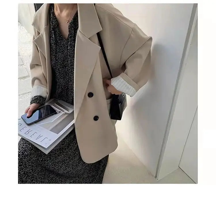 Creamy-white oversized blazer coat evoking an old-money-inspired aesthetic