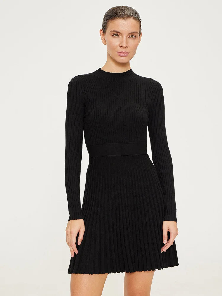 Black pleated mini dress offering a sophisticated and polished look.