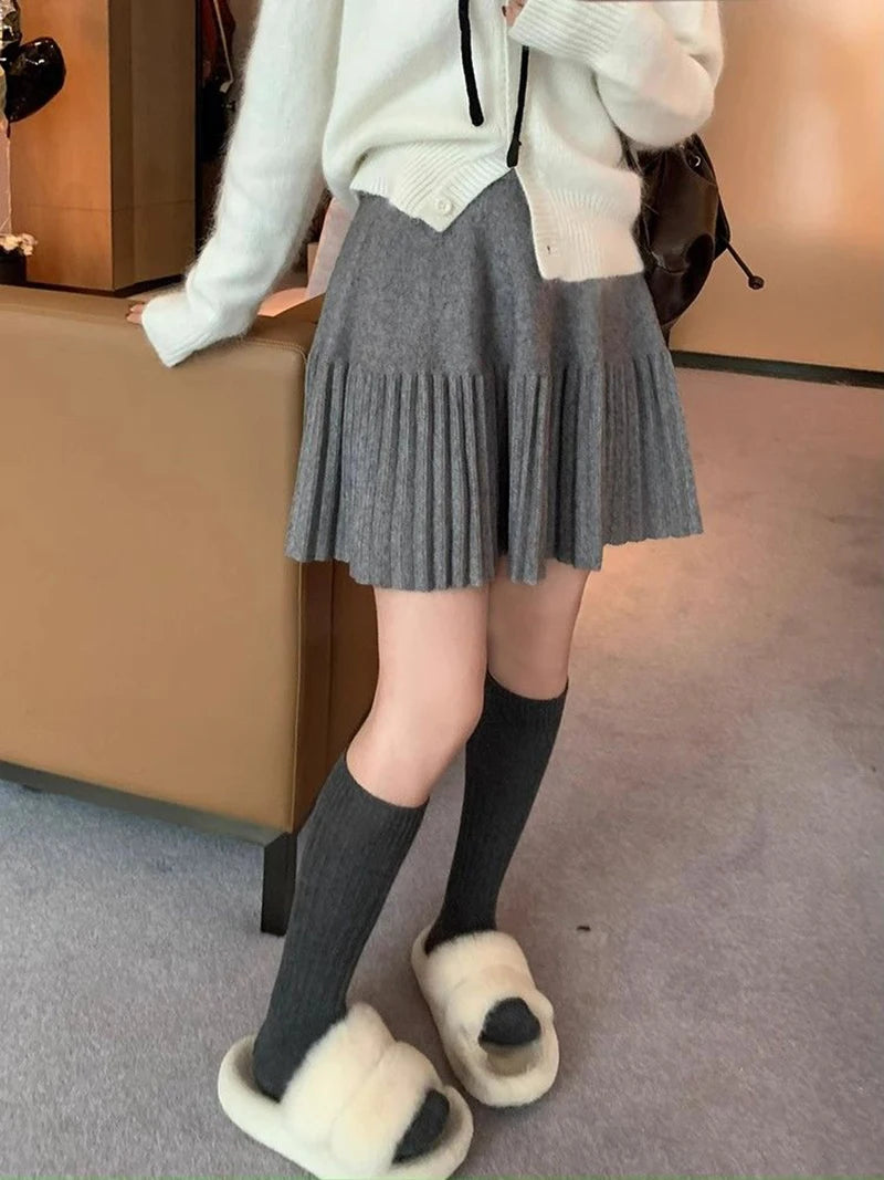 Grey Pleated Mini Skirt styled on model, perfect for a trendy and fashionable outfit.