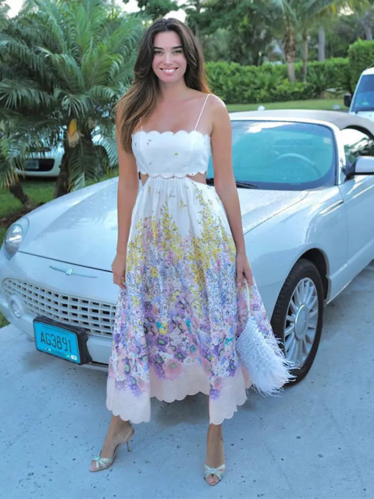 Romantic backless floral midi dress in light purple, combining sophistication and comfort for summer outings