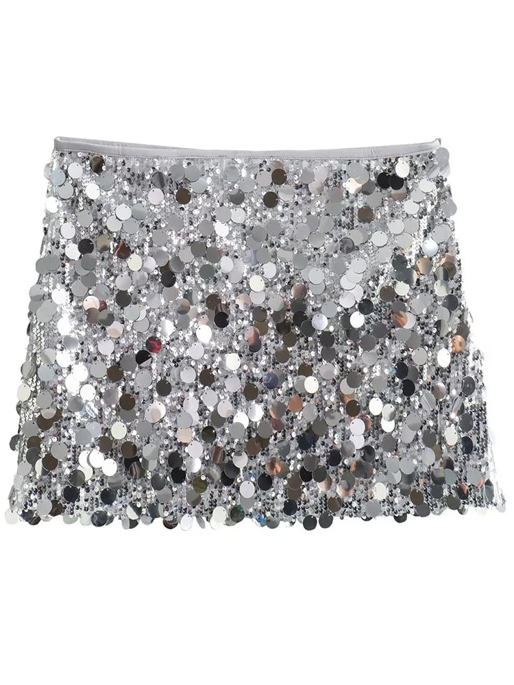 Side view of a silver sequined mini skirt with a chic high-waist fit for party wear.