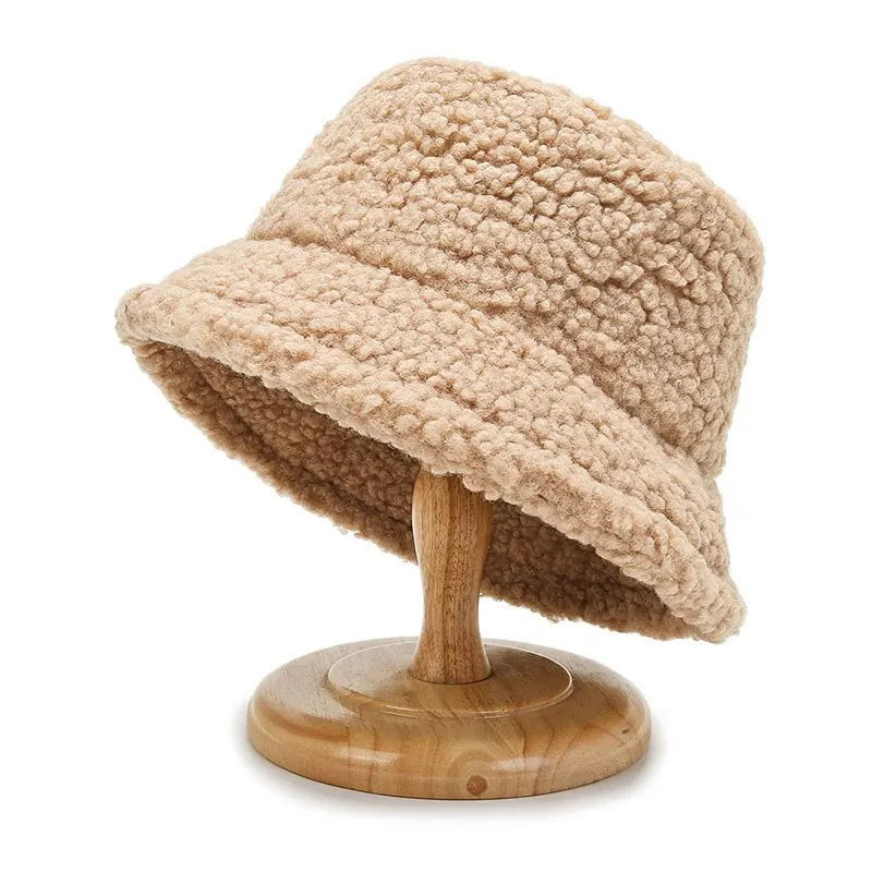 Stylish beige teddy bucket hat, a perfect winter accessory for trendy outfits