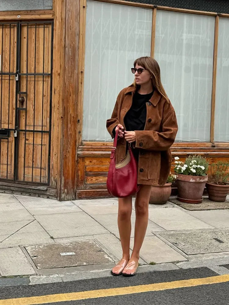 High-street fashion with a trendy brown suede jacket, ideal for casual and chic outfits
