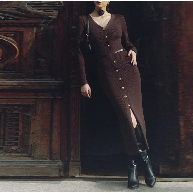 Coffee-colored V-neck knitted long dress worn by model, creating a warm and stylish appearance.