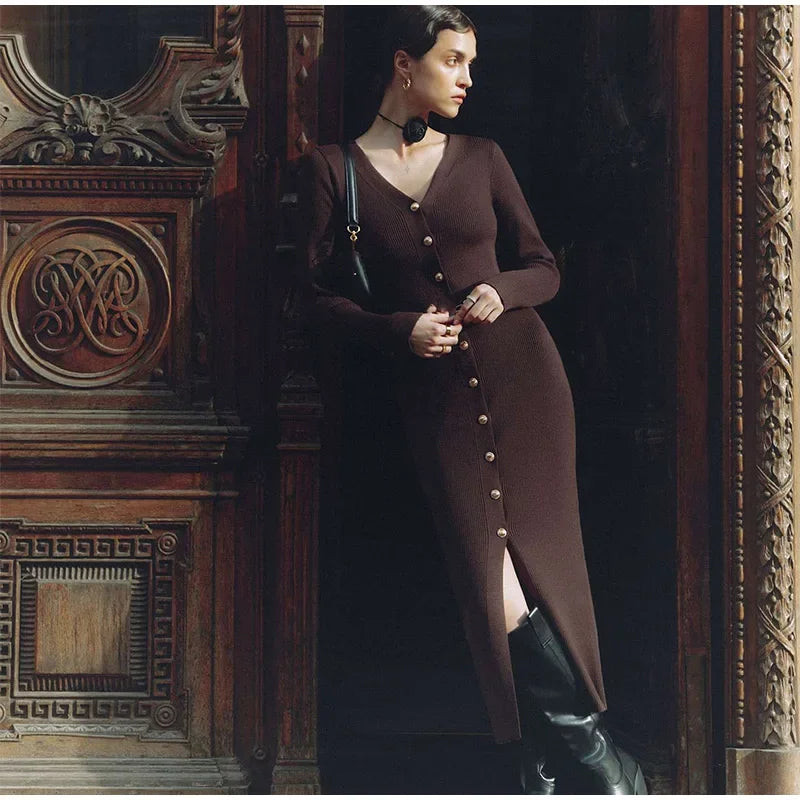 Model looking to the side while wearing the Coffee V-neck knitted long dress, showcasing its elegance.