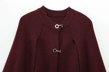 Burgundy cape with silver buttons on a white background