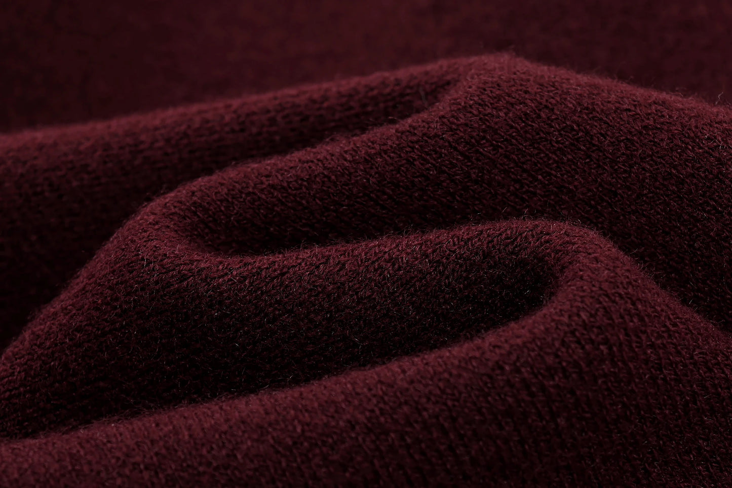 Close-up of textured burgundy fabric