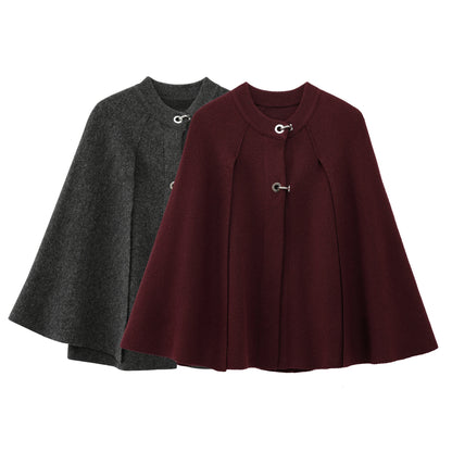 Two capes, one gray and one burgundy, on a white background