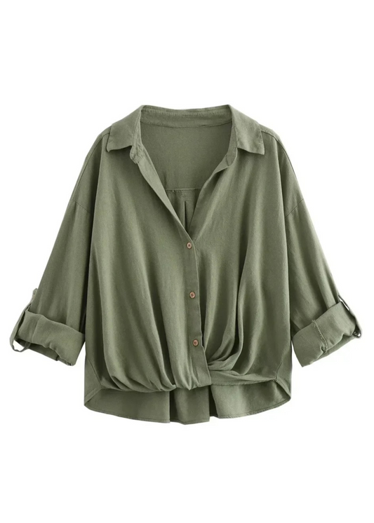Green button-up shirt with rolled-up sleeves on a white background
