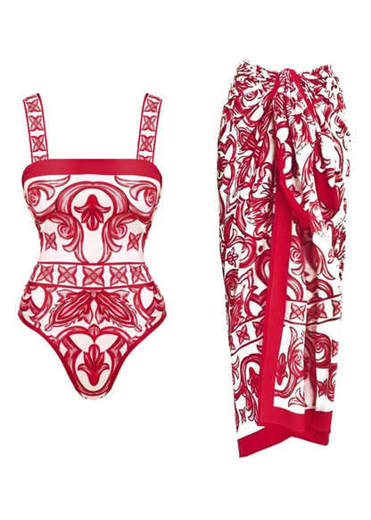 Red and white patterned swimsuit and sarong on a white background